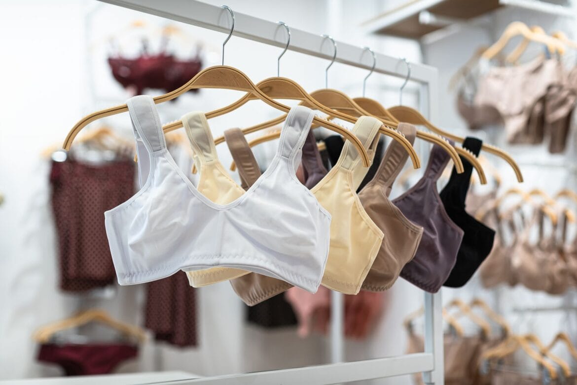 A rack of wireless bras in assorted colors at a lingerie store