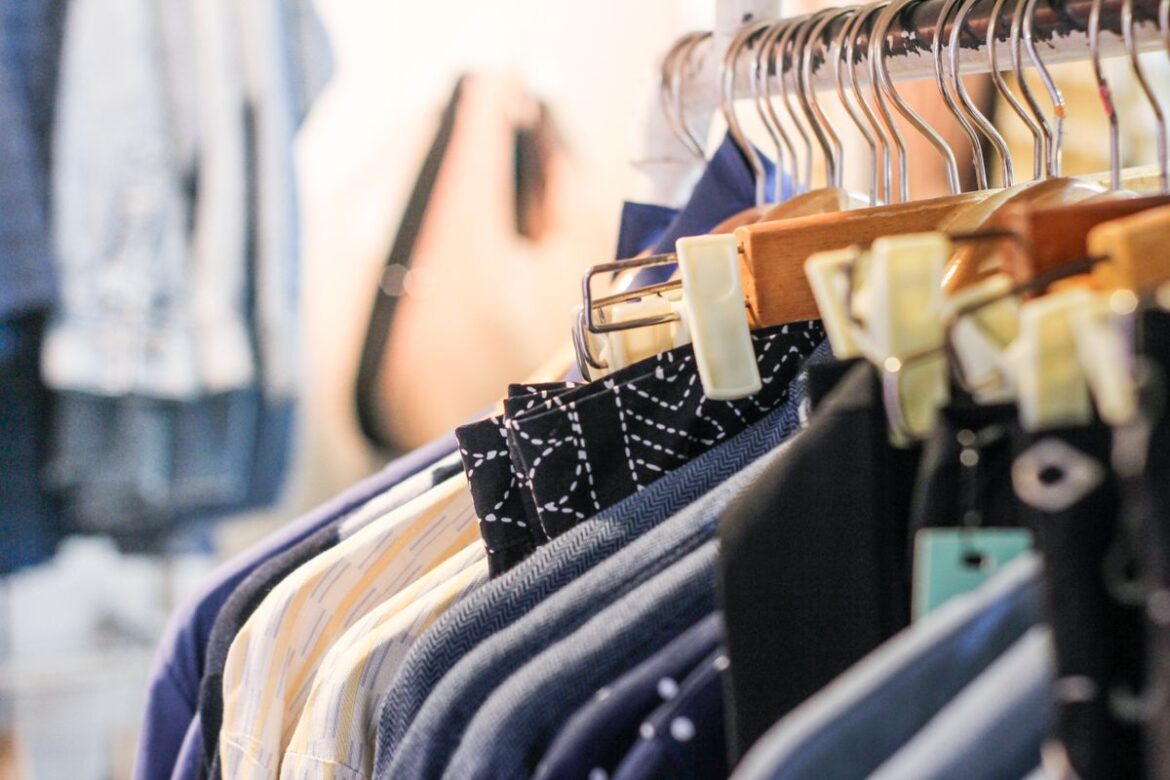 Vibrant fashion collection hanging in a boutique