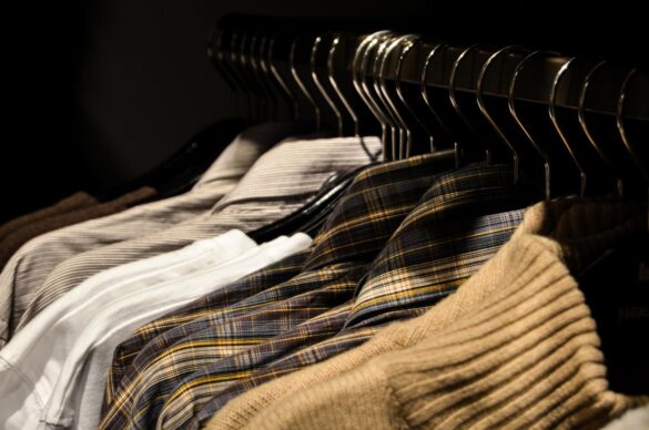 Organized display of casual shirts on hangers