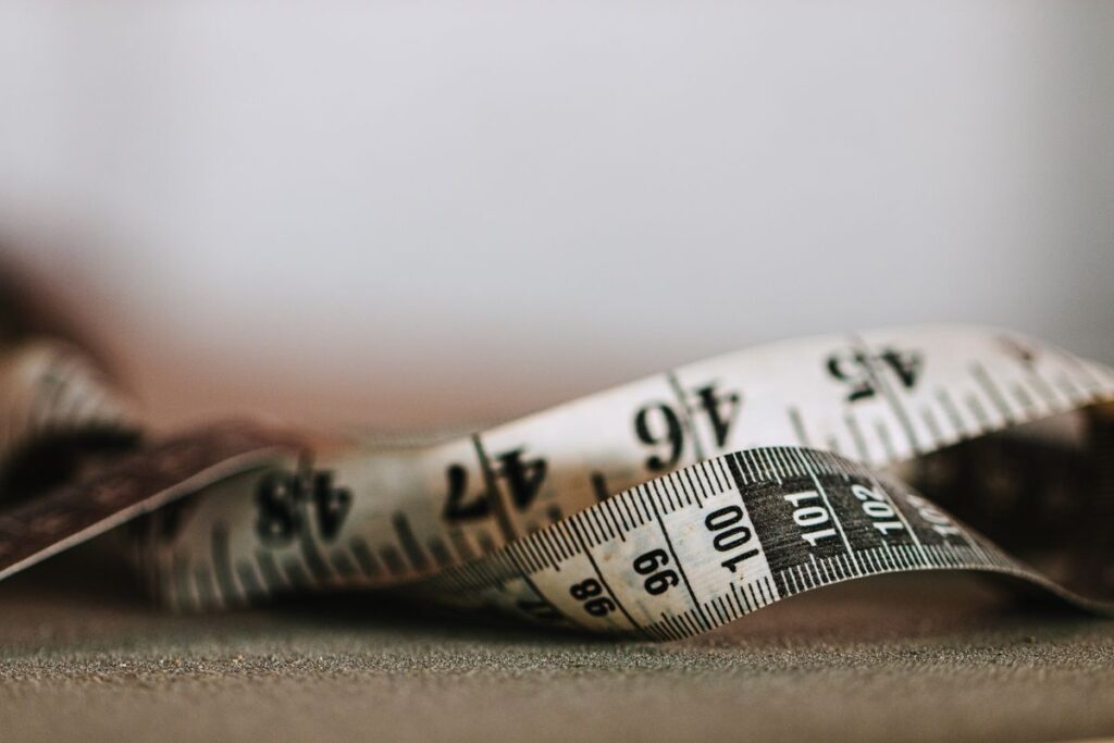 Close-up of a soft measuring tape used for bra fitting
