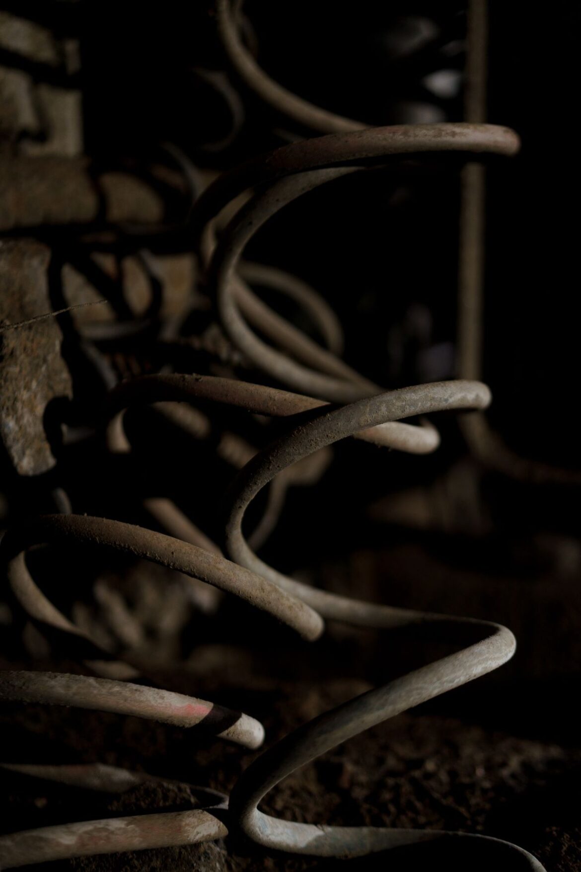 Close-up metal spring coil, representing underwire structure